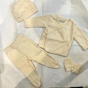 4 piece cream colored newborn outfit